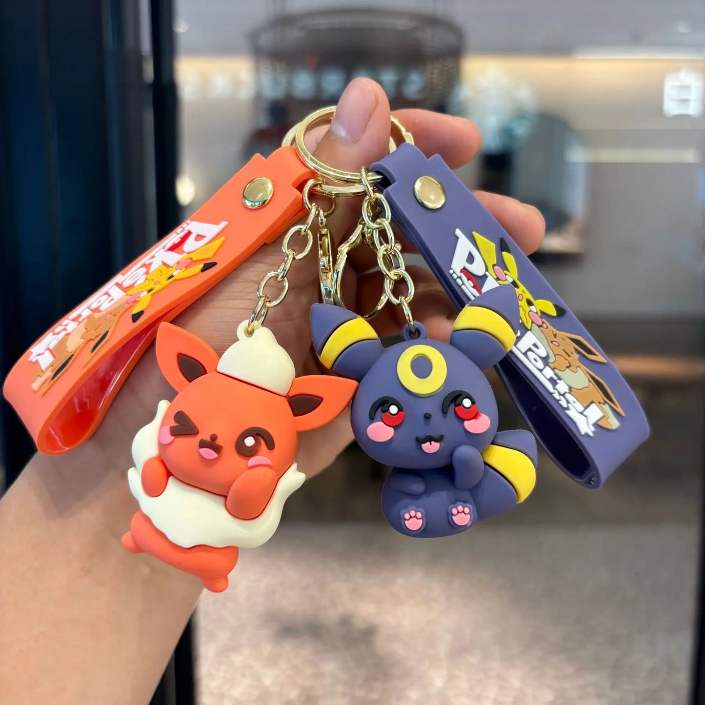 Pokémon Eevee Family Keychain Gift Set, Complete Evolution Plush Keychain with Official Pokéball Clip, Adorable Key Ring for Kid